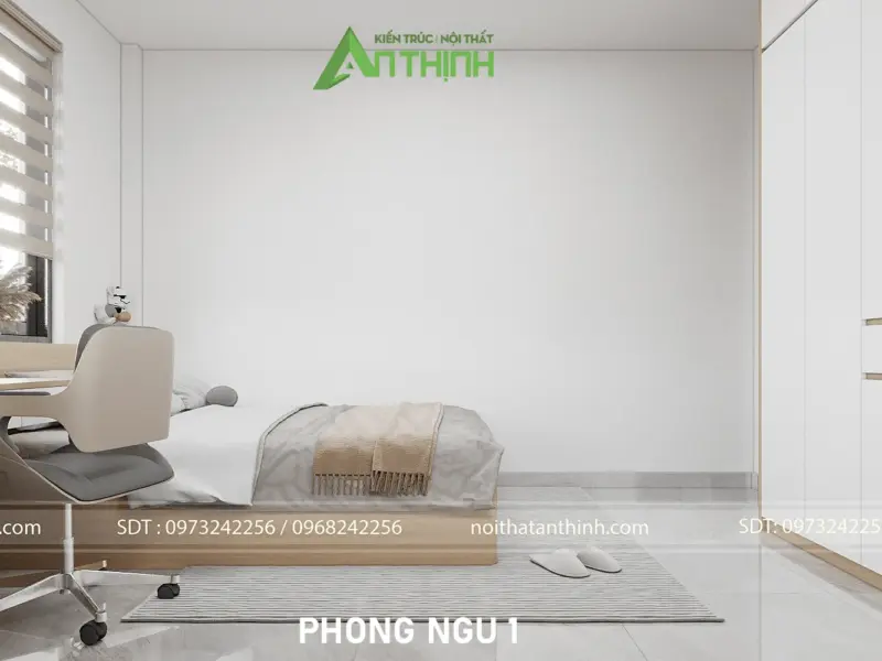 Góc bàn học phòng ngủ 1 – bàn học liền tường hướng cửa sổ xanh, tủ trắng cao kịch trần, giường đơn nhỏ gọn phù hợp trẻ em
