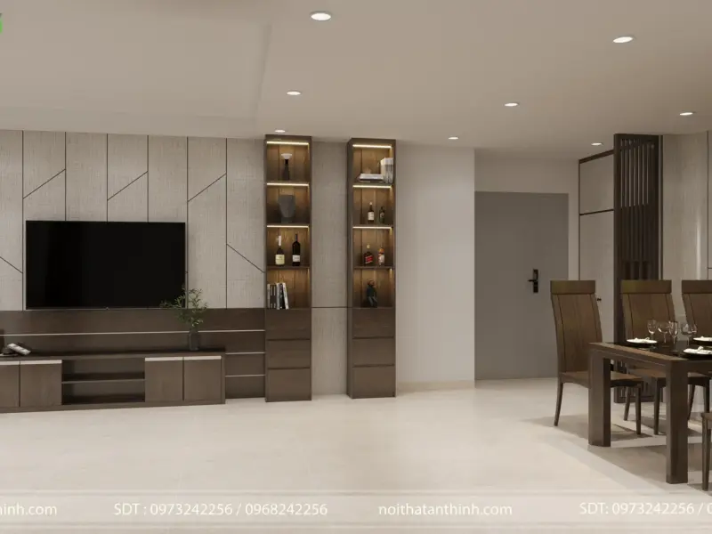 Phòng khách với kệ tivi panel vải vân chìm, kết hợp tủ trang trí có đèn spotlight, mang lại cảm giác hiện đại, tối giản