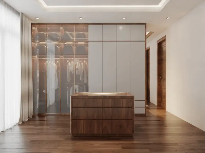 Walk-in closet góc nhìn thứ 2 – thanh treo quần áo phân tầng có ánh sáng spot, tủ cánh trắng kết hợp gỗ đồng bộ toàn bộ không gian