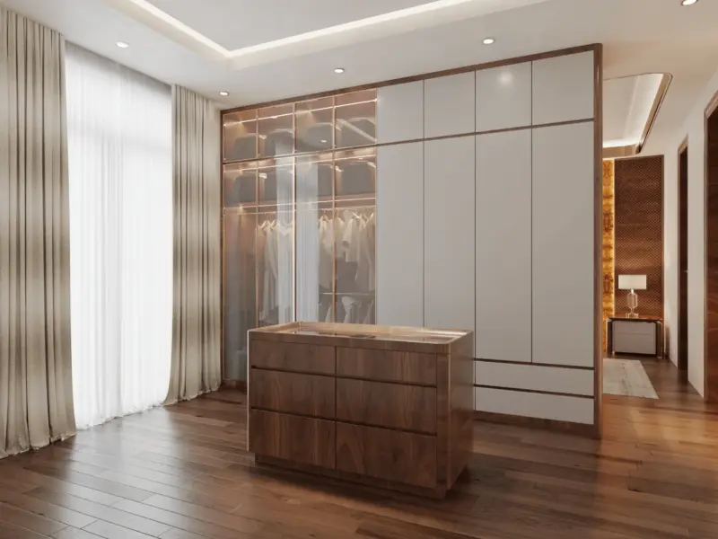 Walk-in closet – tủ quần áo kính khung vàng đồng có đèn LED nội thất, tủ trắng cao kịch trần, đảo giữa gỗ óc chó để phụ kiện